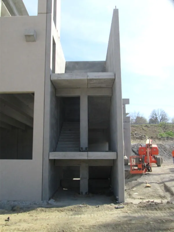 Burns & McDonnell Parking Garage: “T-shape” supports at cantilevered precast stairs.