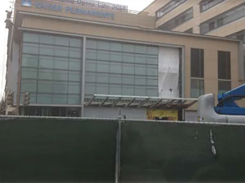 Kaiser Permanente: Panels with windows and metal paneling.